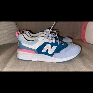 Pink and blue New Balance sneakers